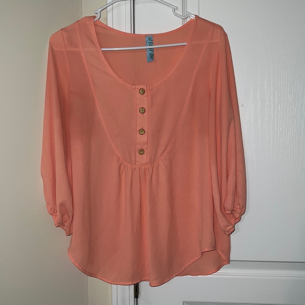 Long sleeve peach top with gold colored button detail